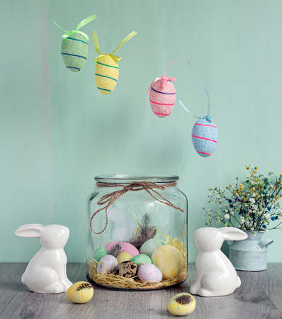 Easter is the bright and kind holiday with the spring breath. Eggs, cakes and rabbits are the main symbols of this day.の写真素材