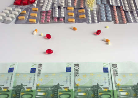 Medicines are becoming more expensive. A lot of money is spent on pills all over the world.の写真素材