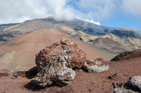 Southern flank of Mount Etna, an active stratovolcano on the east coast of Sicily, Italy, showing lateral crater and lava rocks to the right from cableway of Sapienza Refuge ski area.の写真素材