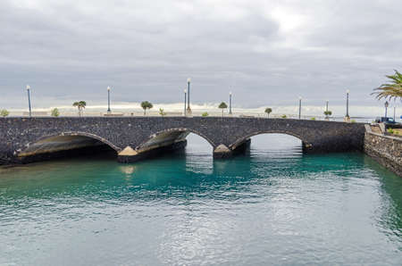 Arrecife, Spain - November 5, 2018: Waterfront of the town and the popular seaside promenade along...