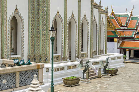 Scripture Hall Phra Mondop with mythological bird like creatures as guardian figures in a Buddhist temple complex Wat Pho also known as the Temple of the Reclining Buddha in Bangkokの写真素材