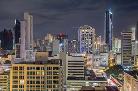 Panama City, Panama - November 3, 2017: Skyline of Panama City at night with Towerbank and Veneto Grand Hotel. View from the roof of the hotel Tryp by Windham.のeditorial素材