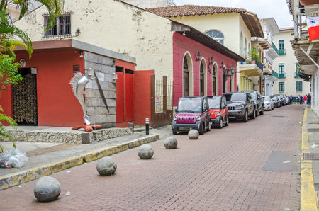 Panama City, Panama - November 3, 2017: A street in the historic district Casco Viejo (Spanish for Old Quarter), also known as Casco Antiguo or San Felipe, with old buildings and cars in Panama City.のeditorial素材