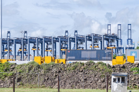 Panama City, Panama - November 3, 2017: Cranes and containers in a Port of Balboa, the Pacific-side port of the Panama Canal.のeditorial素材