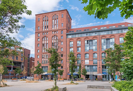 Berlin, Germany - June 28, 2021: Frieda-Arnheim-Promenade, a part of the Schultheiss neighborhood in the public project "Wasserstadt Spandau", which aims to develop the former industrial wastelandsのeditorial素材
