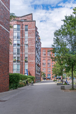 Berlin, Germany - June 28, 2021: Frieda-Arnheim-Promenade, a part of the Schultheiss neighborhood in the public project "Wasserstadt Spandau", which aims to develop the former industrial wastelandsのeditorial素材