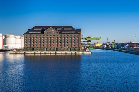 Berlin, Germany - November 7, 2020: Westhafen port BEHALA, inland port and operator of the trimodal freight hub with the building of the Customs bonded warehouseのeditorial素材