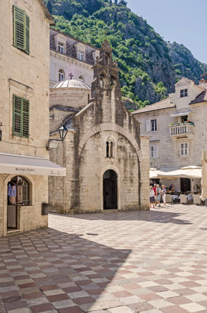 Kotor, Montenegro - June 8, 2017: Saint Luke square with the St. Luka's one-nave church, built by Mauro Kacafrangi in 1195, example of the Romanesque and Byzantine architecture in the old town of Kotor. It is a part of UNESCO's World Heritage Site.のeditorial素材