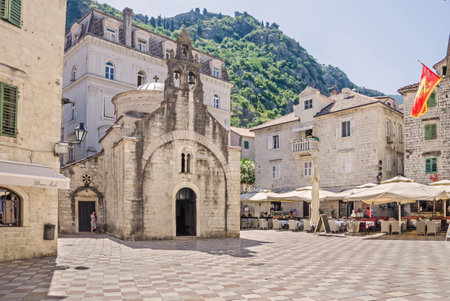 Kotor, Montenegro - June 8, 2017: Saint Luke square with the St. Luka's one-nave church, built by Mauro Kacafrangi in 1195, example of the Romanesque and Byzantine architecture in the old town of Kotor. It is a part of UNESCO's World Heritage Site.のeditorial素材
