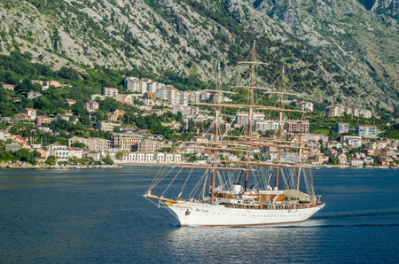 Kotor, Montenegro - June 8, 2017: A four-masted sailing vessel (sailing cruise liner) Sea Cloud moving into the port of Kotor.のeditorial素材