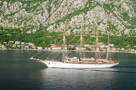 Kotor, Montenegro - June 8, 2017: A four-masted sailing vessel (sailing cruise liner) Sea Cloud moving into the port of Kotor.のeditorial素材