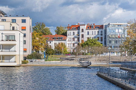 Berlin, Germany - October 12, 2021: Harbor basin Tegeler Hafen with old and modern buildings in the fallのeditorial素材