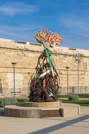 Civitavecchia, Italy - October 30, 2019: Wall of the Fort Michelangelo with a memorial monument to the Carabinieri, the national gendarmerie of Italy, " La Flama" by architect Alfiero Antonini, in Civitavecchia Port of Rome.のeditorial素材