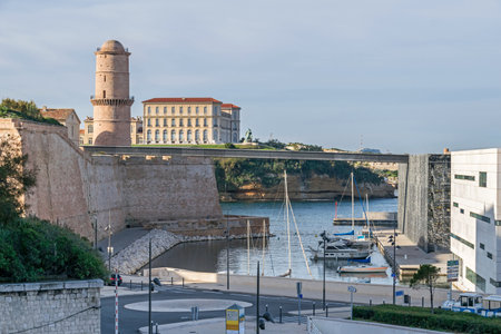 Marseille, France - November 1, 2019: Historic port area with promenade Esplanade J4, Fort Saint-Jean, palace Palais du Pharo and MuCEM, Museum of European and Mediterranean Civilizationsのeditorial素材