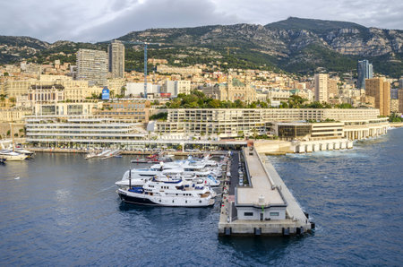 Monaco, Principality of Monaco - November 3, 2015: The view of the country's first casino and the most populous Quartier, Monte Carlo, and of Port Hercules from the Mediterranean Sea.のeditorial素材