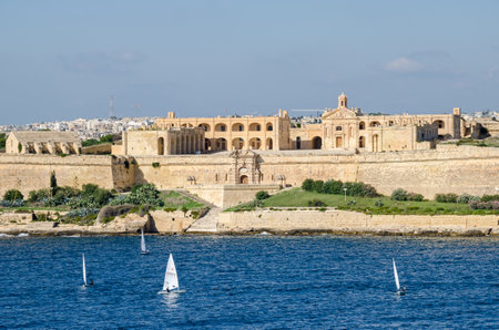 Valletta, Malta - November 8, 2015: View of Fort Manoel - an example of Baroque architecture, - on Manoel Island in Gzira from the sea. Fort Manoel is located to the north west of Valletta, and commands Marsamxett Harbour and the anchorage of Sliema Creekのeditorial素材