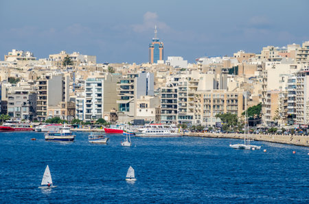 Gzira, Malta - November 8, 2015: View of Gzira, a town located in  Marsamxett Harbour, as seen from Valletta. Waterfront and densely built-over modern buildings.のeditorial素材