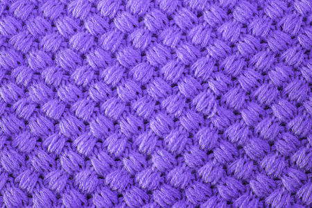 Ultra violet knitted fabric made of heathered yarn textured background. Colour trends on design wallpapers.の写真素材
