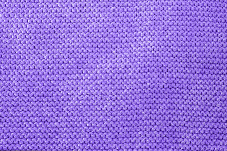 Knit texture of violet wool knitted fabric with pattern, place for text. Modern color of the year 18-3838の写真素材