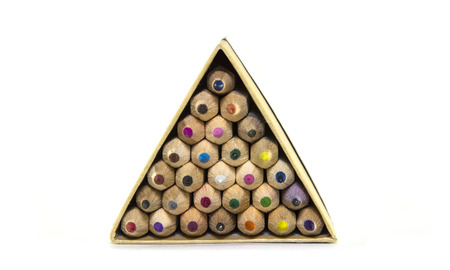 Colored wooden pencils in a triangular package, top view, isolated on a white background close-up.の写真素材