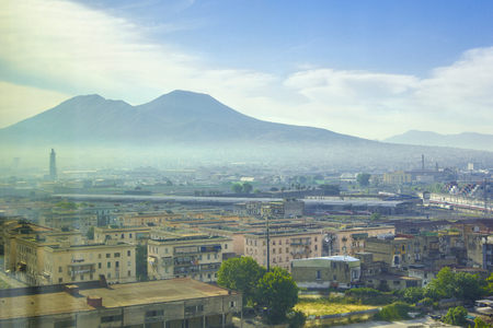 Vesuvius volcano and the city of Naples in morning haze, mist in early morning, Naples, Campania, Italyの写真素材