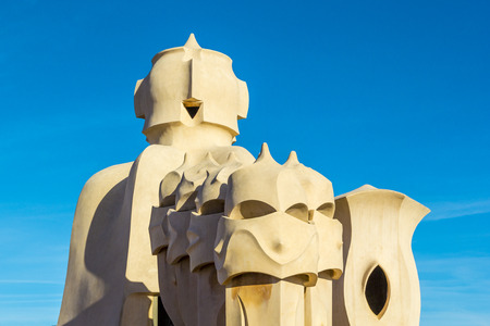 BARCELONA, SPAIN - APRIL 2, 2015: Casa MIla is building famous architect Antonio Gaudi, view from outside, details of roof and chimney, Barcelona, Spainのeditorial素材