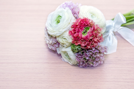 Bouquet of spring pink Ranunculus with different color, selective focus. Wedding flowers, bridal...