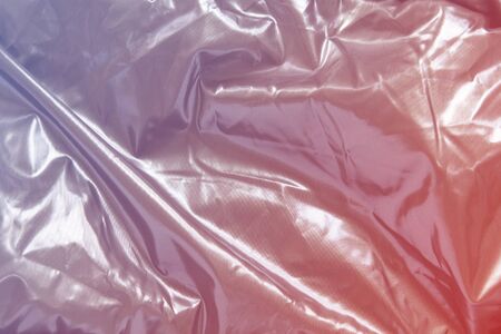 Silver shiny metal background, with neon pink gradient color. Glitter grey, thin sheet foil texture...