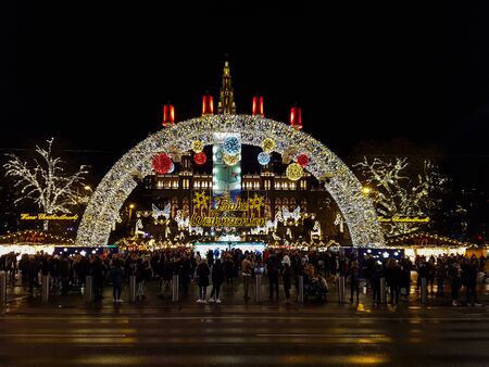 VIENNA, AUSTRIA - NOVEMBER 28, 2019: Traditional Christmas market in front of City hall (Rathaus) and skating rink, Vienna, Austriaのeditorial素材