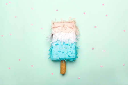 Paper creative  decoration on light blue background. Ice cream in minimal style. Flat lay, top view, copy spaceの写真素材