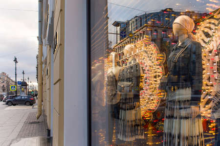 SAINT PETERSBURG, RUSSIA - NOVEMBER 24, 2020: Show window of Dior fashion store, decorated in...