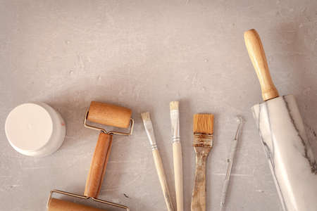 Professional working tools for working with clay, plasticine. Pottery shovels, brushes, rolling pin...