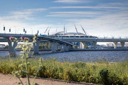 St. Petersburg, Russia - June 16, 2021: View from Neva river and Finnish Gulf to new stadium Arena Zenith and high-speed highway West High Speed Diameter.のeditorial素材