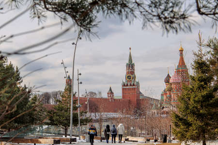 Moscow, Russia - April 2, 2022: Panoramic view of Moscow Kremlin with Spassky Tower and Saint Basils Cathedral in center city on Red Square from Zaryadye park, Moscow, Russia.のeditorial素材
