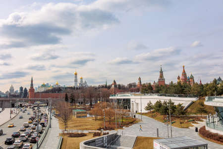 Moscow, Russia - April 1, 2022: Panoramic view of Moscow Kremlin with Spassky Tower and Saint Basils Cathedral in center city on Red Square from Zaryadye park, Moscow, Russia.のeditorial素材