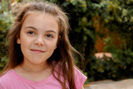Portrait of cheerful laughing little girl on summer day. High quality photoの写真素材