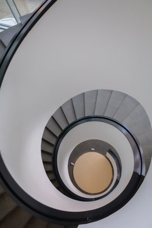 Nuremberg, Germany - July 19, 2023: Beautiful modern art spiral staircase in Neues Museum of...