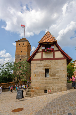 Nuremberg, Germany - July 19, 2023: View of historic Nuremberg Castle.Tourists walk along cobbled streets of old town, Franconia, Bavariaのeditorial素材