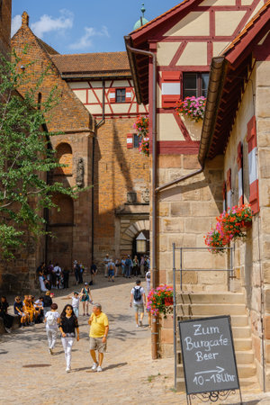 Nuremberg, Germany - July 19, 2023: View of historic Nuremberg Castle.Tourists walk along cobbled streets of old town, Franconia, Bavariaのeditorial素材
