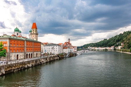 Passau, Germany - July 21, 2023: Panoramic view of Passau, Altes Rathaus, Old Town Hall. Aerial skyline of old town with beautiful reflection in Danube river, Bavaria, Germany.のeditorial素材