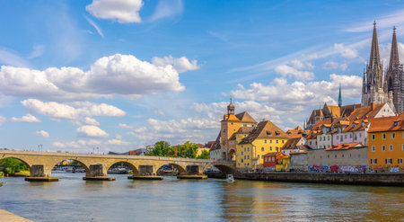 Regensburg, Germany - July 20, 2023: Panoramic view of Historical Stone Bridge and Bridge tower in Regensburg on river Danube, Regensburg, Bavaria, Germanyのeditorial素材