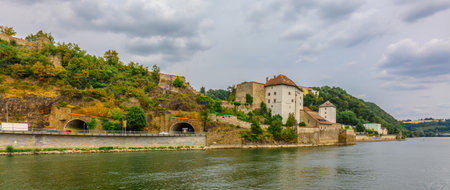 Passau, Germany - July 21, 2023: Panoramic view castle Veste Niederhaus Fortress on river Danube. Antique fortress in Passau, Lower Bavaria, Germanyのeditorial素材