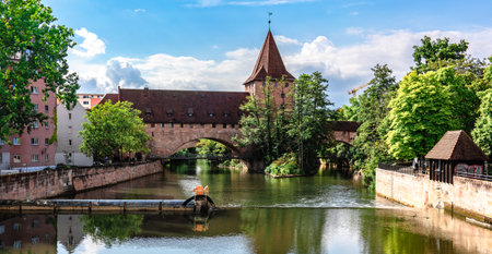 Nuremberg, Germany - July 26, 2023: Colourful historic old town with half-timbered houses of Nuremberg. Bridges over Pegnitz river. Nurnberg, eastern Bavaria, Germany. High quality photoのeditorial素材
