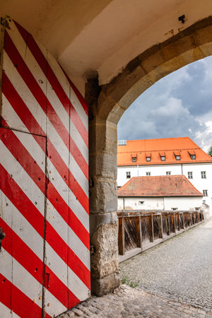 Passau, Germany - July 21, 2023: View of Veste Oberhaus castle. Inner courtyard of medieval castle with gates and arches, Passau, Germany. Vertical photoのeditorial素材