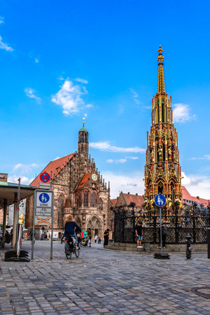 Nuremberg, Germany - July 30, 2023: Famous view of old town on Hauptmarkt square in Nuremberg in Franconia, Bavaria, Germany. Beautiful panoramic view of Hauptmarkt square and Church of Our Lady, vertical photoのeditorial素材