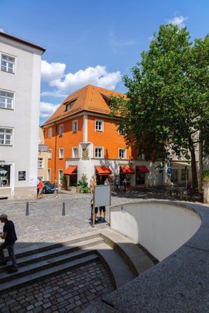Regensburg, Germany - July 20, 2023: Colorful houses in old streets of Regensburg, eastern Bavaria, Germany. Vertical photoのeditorial素材