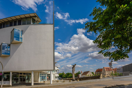 Regensburg, Germany - July 20, 2023: Panoramic view of bridge on river Danube and modern glass buildings, Regensburg, Bavaria, Germanyのeditorial素材