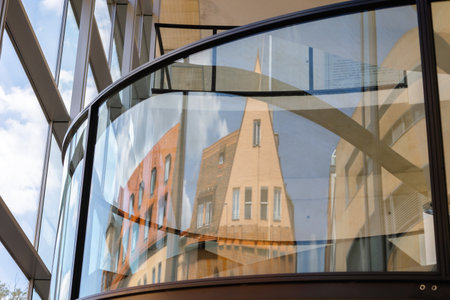Nuremberg, Germany - July 19, 2023: Panoramic view of beautiful houses and rooftops of old city through glass windows of modern art Neues Museum of Nurnberg, Franconia, Bavariaのeditorial素材