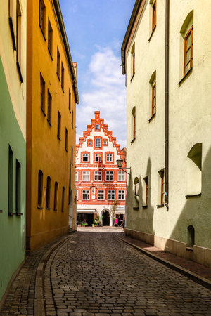 Landshut, Germany - July 24, 2023: Panoramic view of traditional colorful gothic houses in Old Town, Landshut, Bavaria, Germany. Vertical photoのeditorial素材