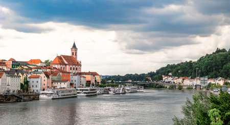 Passau, Germany - July 21, 2023: Panoramic view of Passau. Aerial skyline of old town with beautiful reflection in Danube river, Bavaria, Germany.のeditorial素材